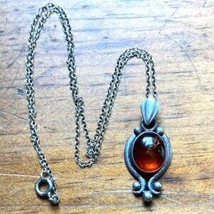 Delicate amber & sterling silver pendant on sterling chain